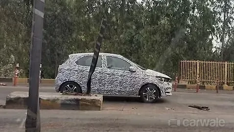 New Tata Tiago facelift spied with Tata Altroz-inspired fascia New Tata Tiago facelift spied with Tata Altroz-inspired fascia