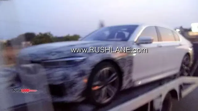 Partially camouflaged BMW 7 Series facelift spied in India Partially camouflaged BMW 7 Series facelift spied in India