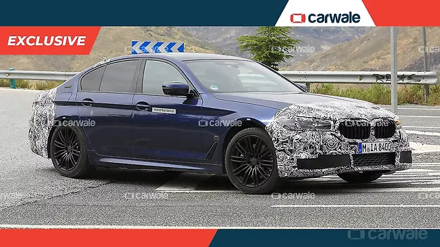 India-bound BMW 5 Series facelift spied in hybrid guise India-bound BMW 5 Series facelift spied in hybrid guise