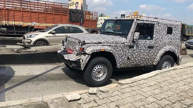 New Mahindra Thar spy shots reveal its production-spec front bumper New Mahindra Thar spy shots reveal its production-spec front bumper