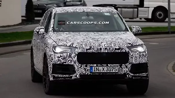 Audi continues testing the new Q7; designers rework the styling Audi continues testing the new Q7; designers rework the styling