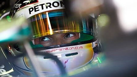 Lewis Hamilton takes pole in rain hit qualifiers in Malaysia