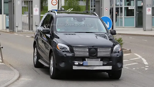 The 2015 Mercedes ML-Class spied with minimal camouflage The 2015 Mercedes ML-Class spied with minimal camouflage