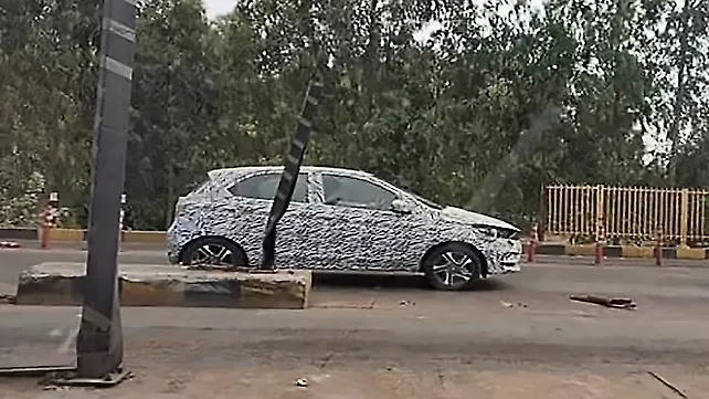 New Tata Tiago facelift spied with Tata Altroz-inspired fascia New Tata Tiago facelift spied with Tata Altroz-inspired fascia