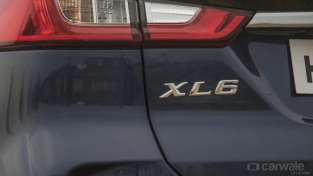 Maruti Suzuki XL6 facelift spotted at dealer stockyards