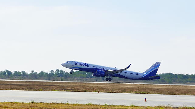 An Indigo aircraft taking off.