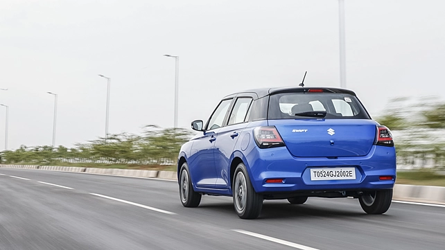 Maruti Suzuki Swift Left Rear Three Quarter Maruti Suzuki Swift Left Rear Three Quarter