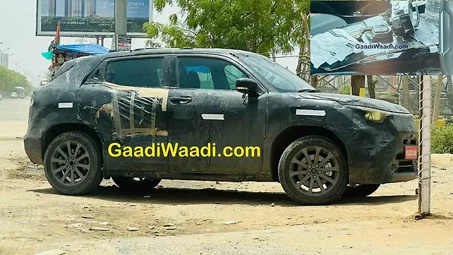 Maruti Suzuki eVX gear lever design leaked in new spy shots Maruti Suzuki eVX gear lever design leaked in new spy shots