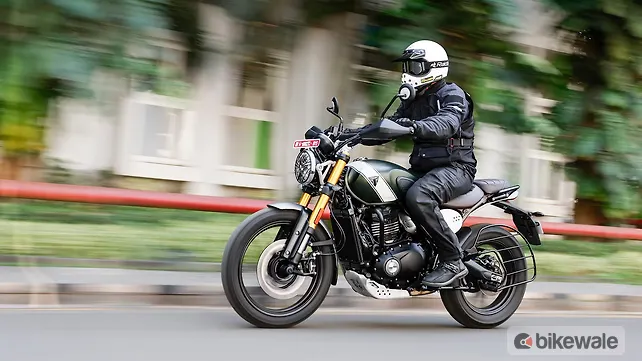 Triumph Scrambler 400 X riding on the road