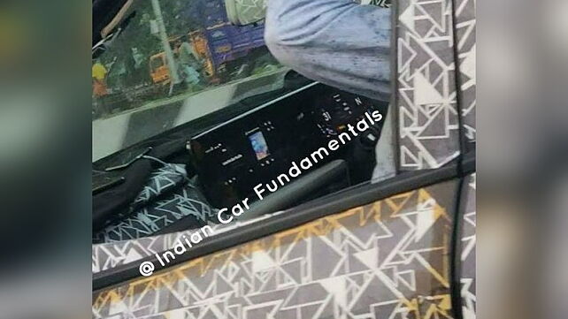 New Mahindra XUV500 sighted again; dual-screen dashboard design leaked