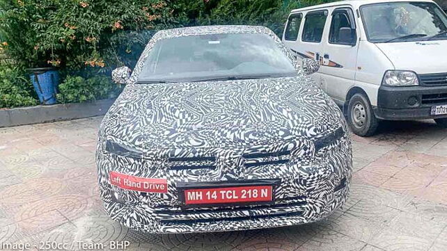 Volkswagen new mid-size sedan spied testing; interior details leaked